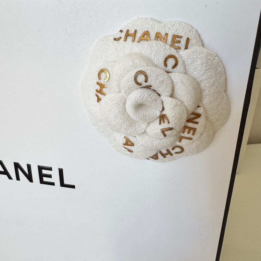 Chanel gift wrapping bag, flower, card, ribbon